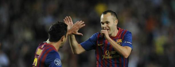 Iniesta y Xavi. Foto: lainformacion.com
