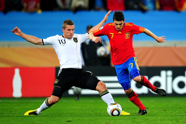 Lukas Podolski y David Villa