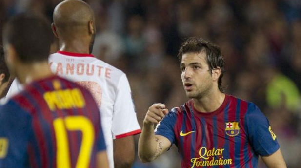 Kanoute y Cesc durante la polémica