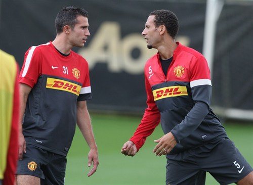 Rio Ferdinand y Robin Van Persie en el Manchester United